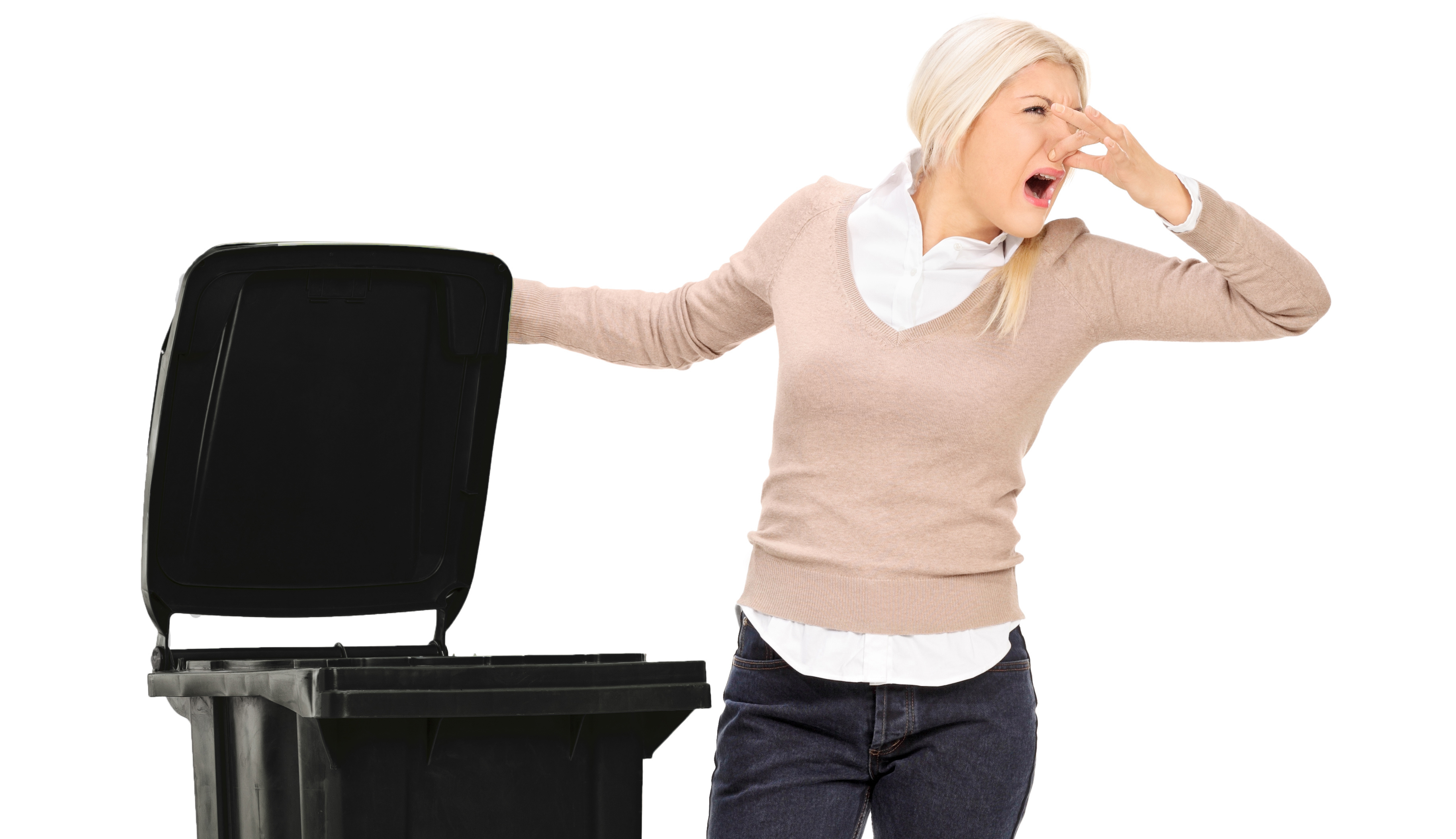 Woman opening a stinky trash can isolated on white background